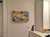 art hung in kitchen
